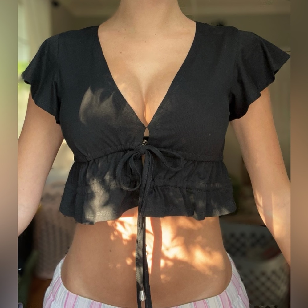 Princess Polly Jamison Reid Crop Top in the color Black
